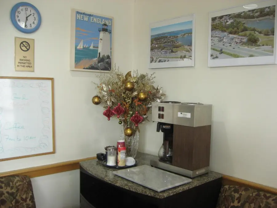 Coffee corner with a New England lighthouse poster